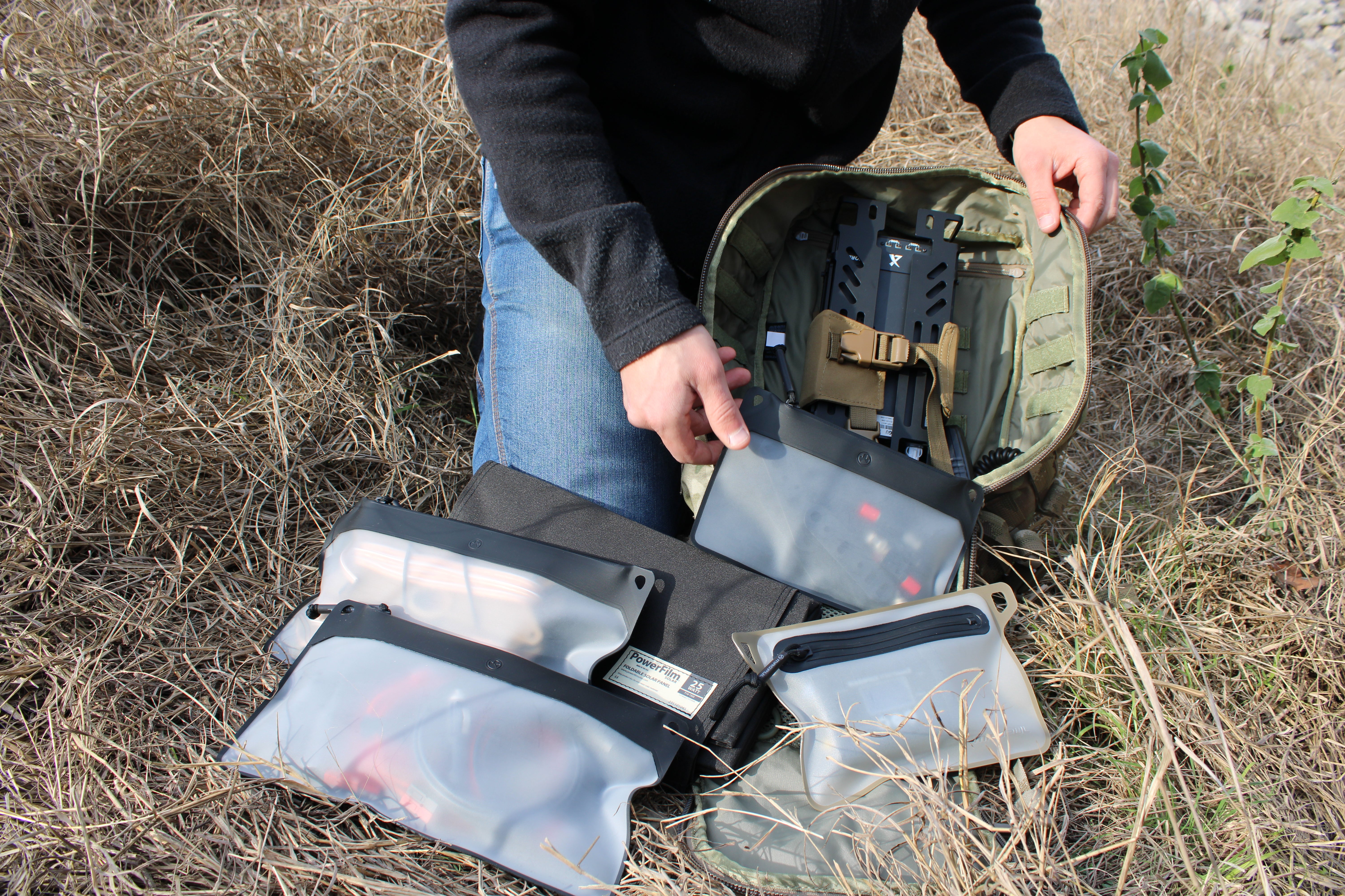 HF Emergency Radio Kit with Xiegu G90 transceiver, solar panels, lithium batteries, antenna kit, and Eberlestock Mission Assault Pack