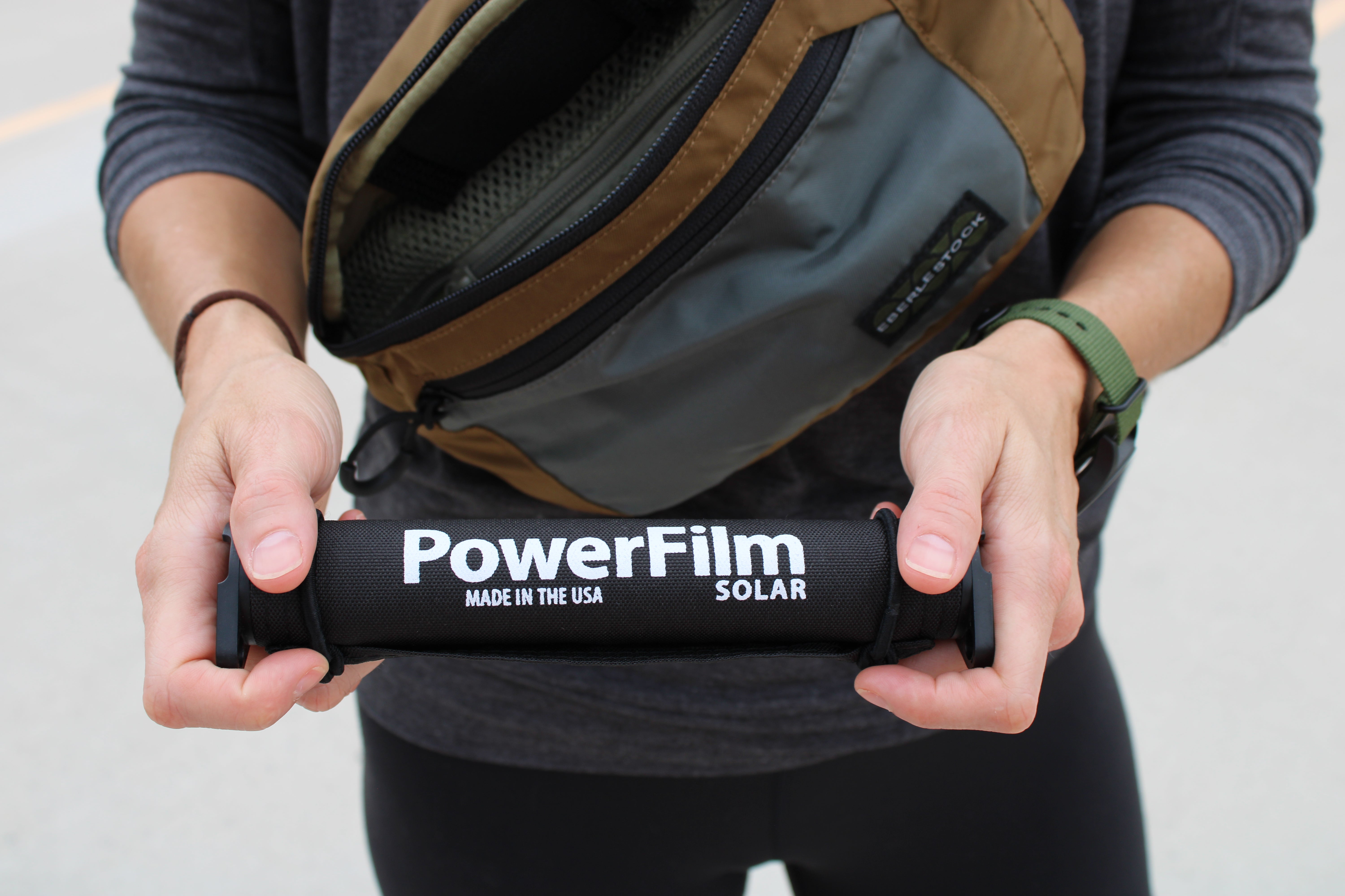 PowerFilm LightSaver portable solar charger with built-in battery for powering radios and small devices off-grid