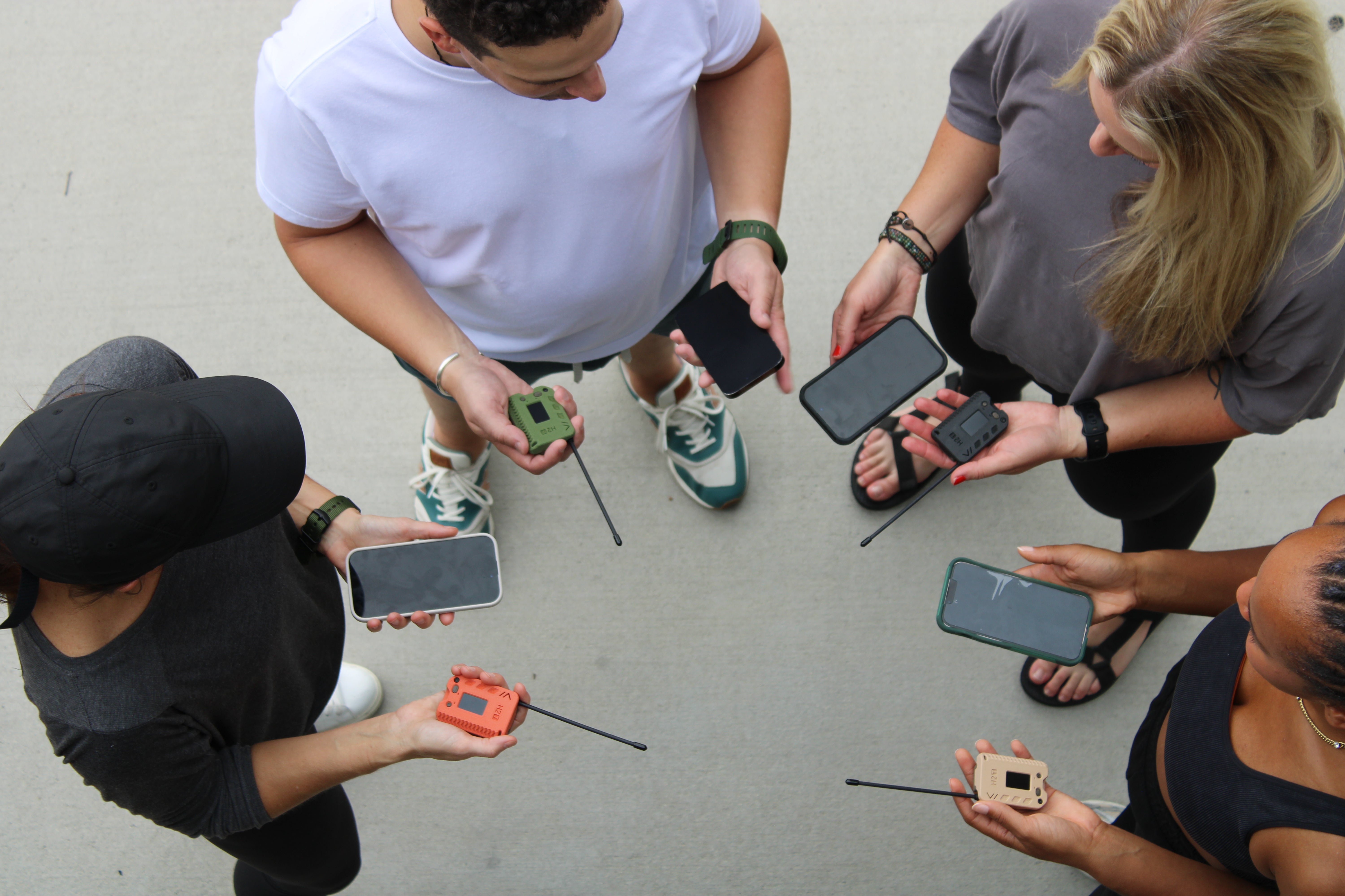 H2T Meshtastic radio paired with smartphone app for private encrypted messaging without cell service