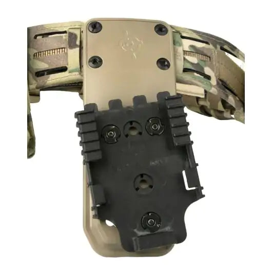 Close-up view of screw posts and MOLLEminus™ field on Holster Adapter